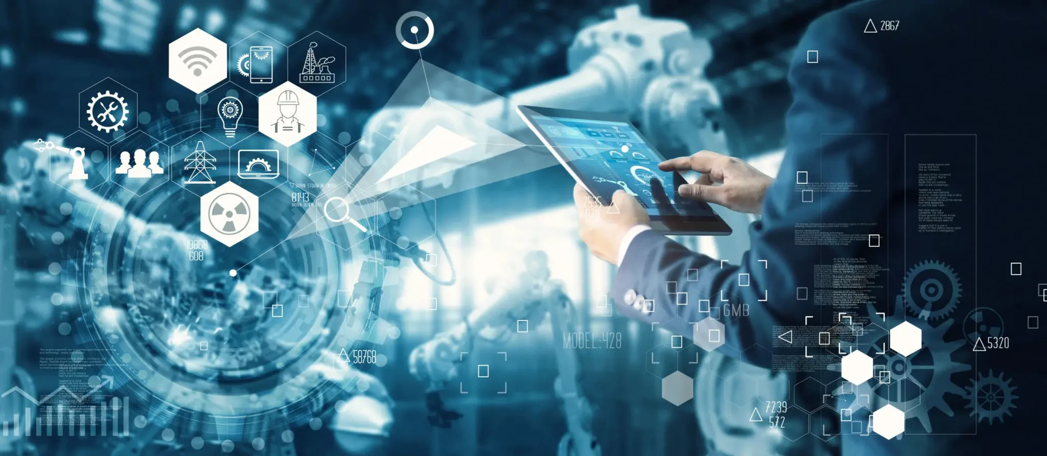 Industrial IoT scene with businessman using tablet on a smart factory floor