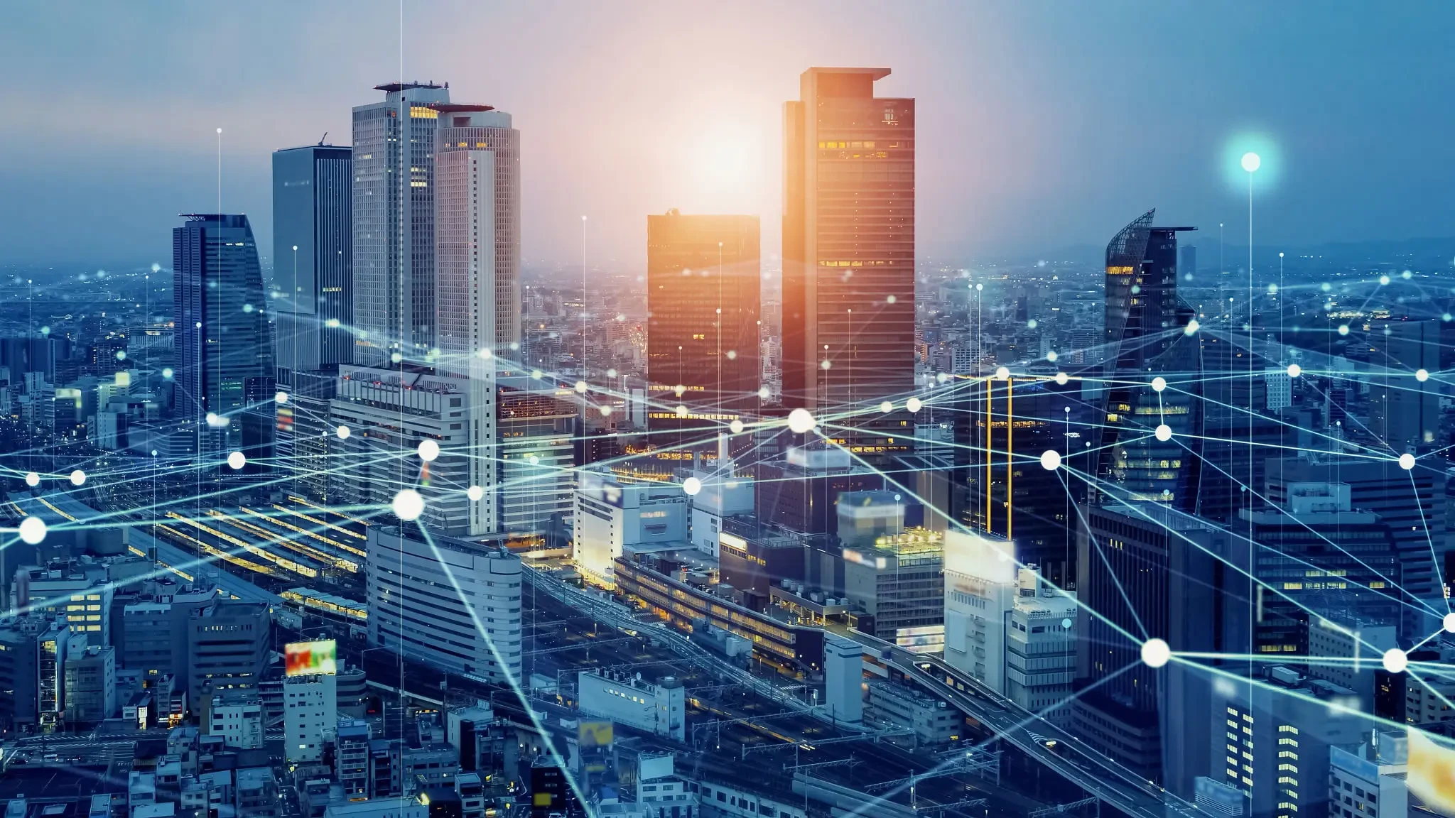 Digital network connections over a city skyline with a brain graphic